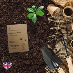 Branded seed packet in a garden 