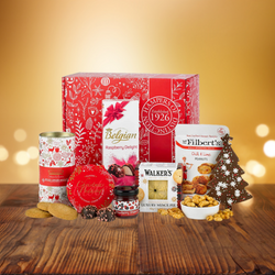 Christmas Hampers with chocolates, biscuits, preserves and a mince pie