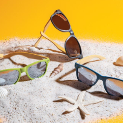 Sustainable Wheat Straw and Bamboo Sunglasses in the sand 