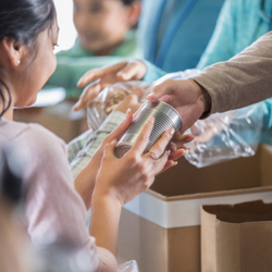 Young girl receiving food at a Food Bank