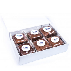 Chocolate brownies in a cardboard letterbox gift box