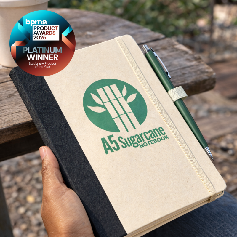 Sugarcane paper A5 notebook with pen loop and branded logo, Platinum Winner at the BPMA Product Awards 2025 for stationery merchandise.