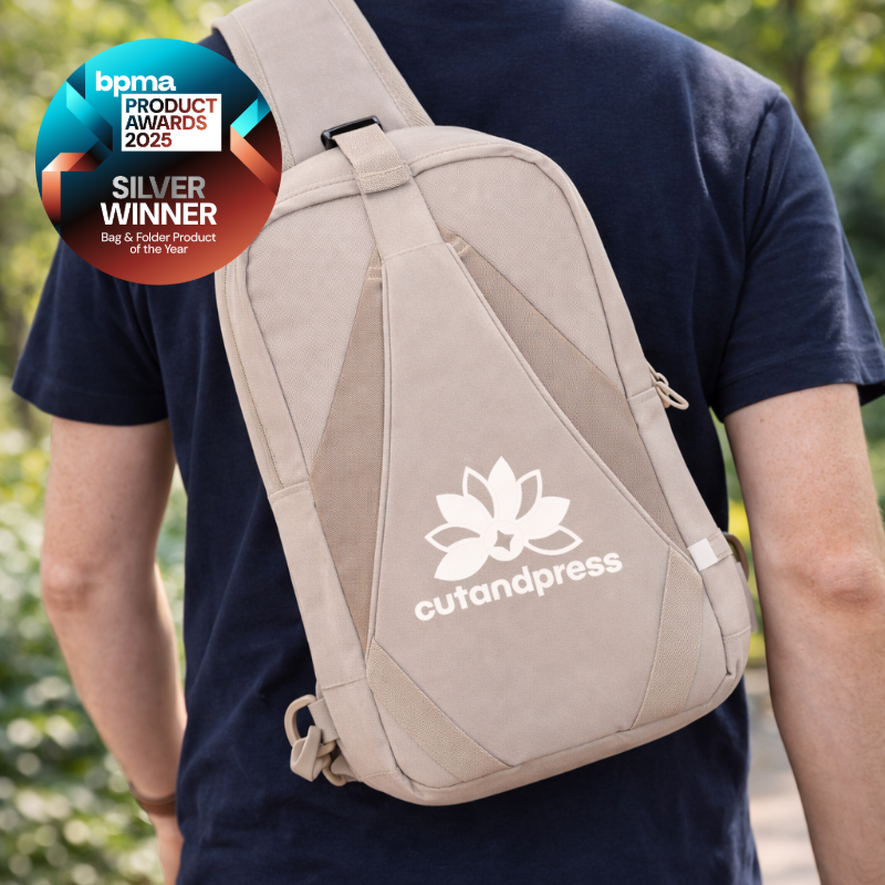 Recycled dual carry sling bag with printed logo, Silver Winner at the BPMA Product Awards 2025 for branded bags and folders.