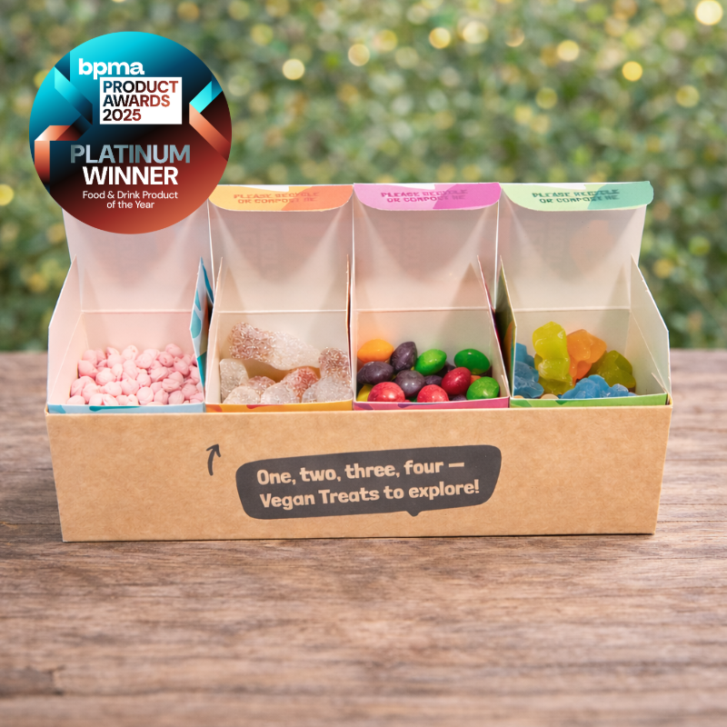 Vegan sweet gift pack with four compartments in plastic-free packaging, Platinum Winner BPMA Product Awards 2025 event giveaway.