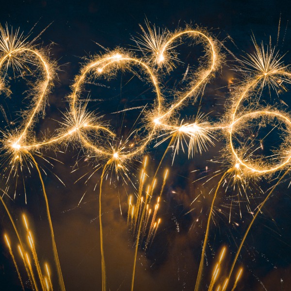 Golden fireworks lighting up the night sky, celebrating New Year’s Eve 2026.